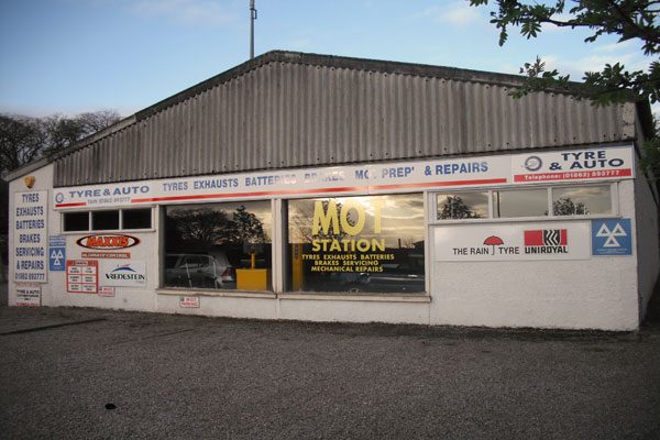 Tyre & Auto garage on Shore Road with the MOT Station window