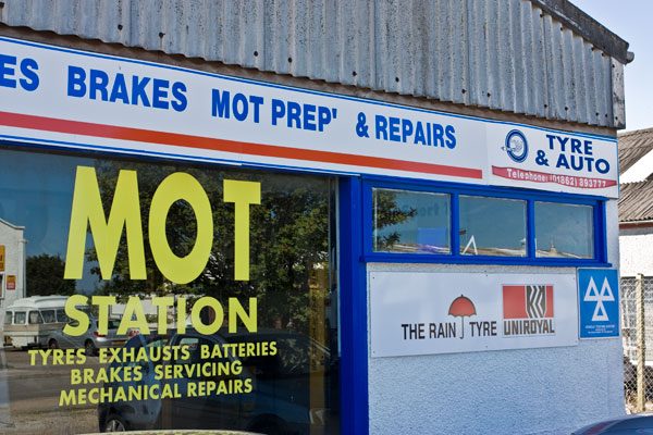 MOT Station sign in the Tyre & Auto front window